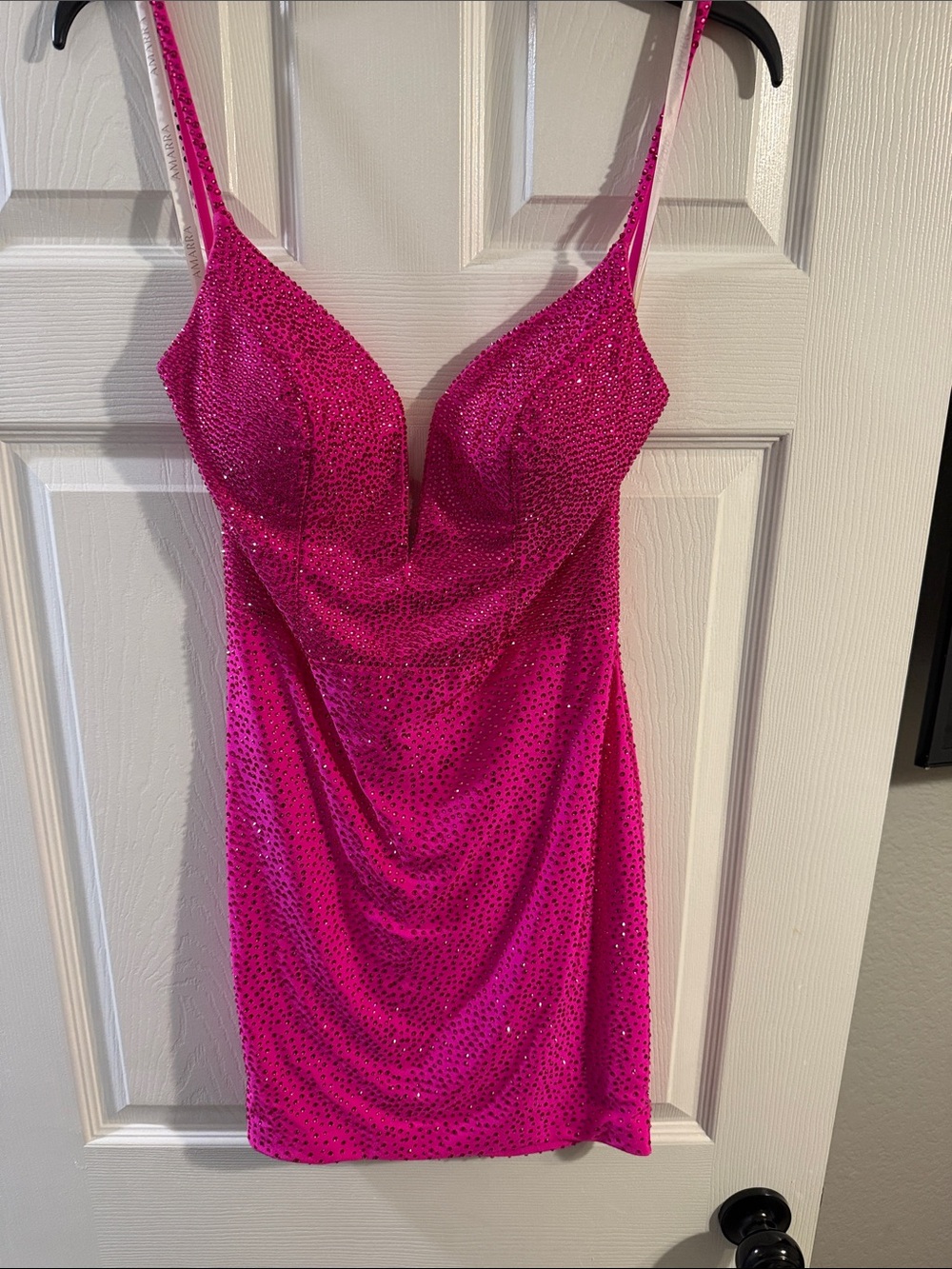 Vibrant fuchsia short fitted V-neck homecoming dress covered in sparkling rhine